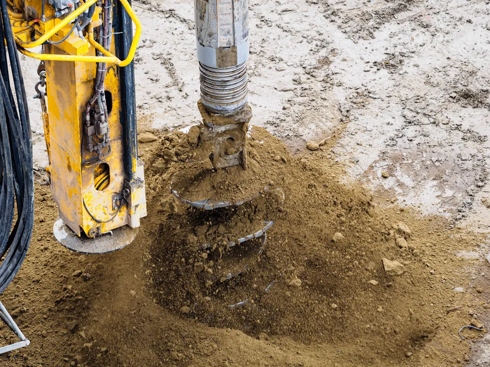 Drilling machine working on soil