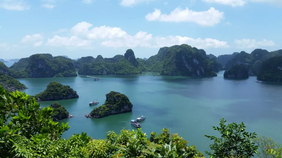 Limestone islands and blue water in Ha Long Bay, Vietnam